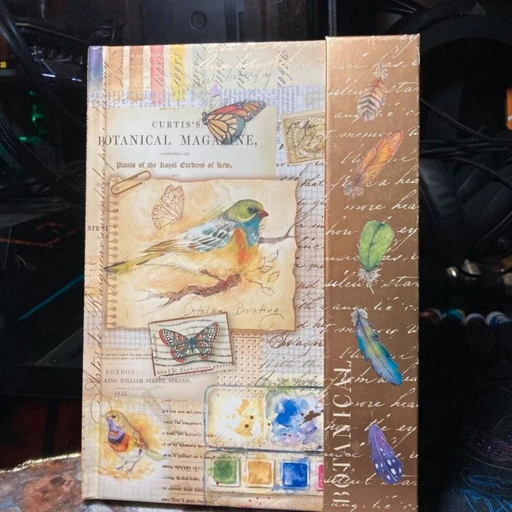 Botanical notebook with bird illustrations holographic details
